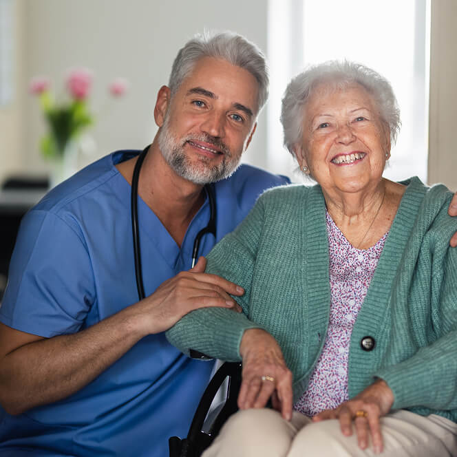 Caregiver Comforting Resident at Assisted Living Facility